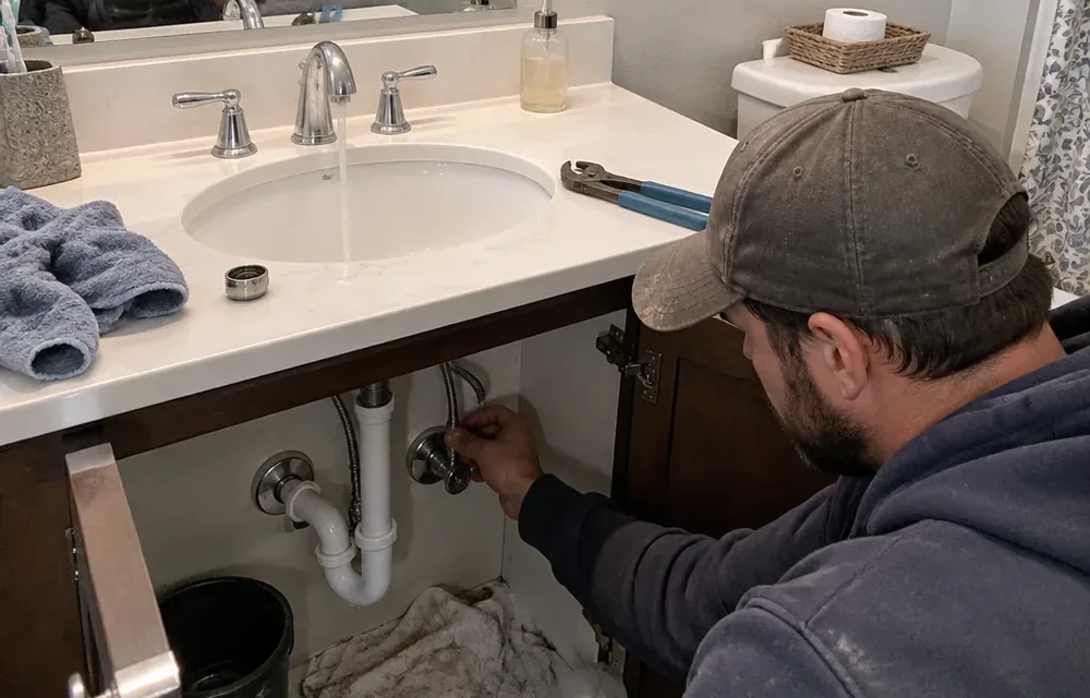 Weak bathroom faucet flow checked during low pressure diagnosis